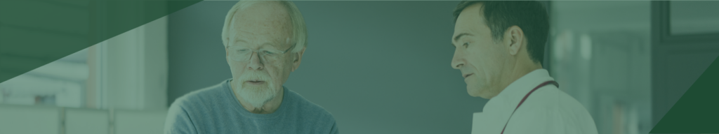 An older man with glasses speaks with a doctor in a white coat, standing together in a medical office with a green overlay effect on the image.